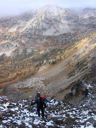 Here we are continuing up the gully with clouds cloaking Saska's summit.